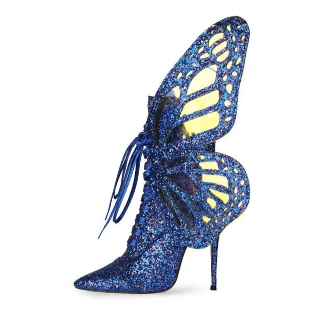 Botas cortas con lentejuelas y alas de mariposa con lentejuelas cruzadas