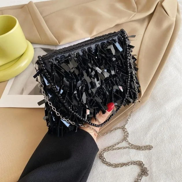 Mode retro handtas met lovertjes en kwastjes