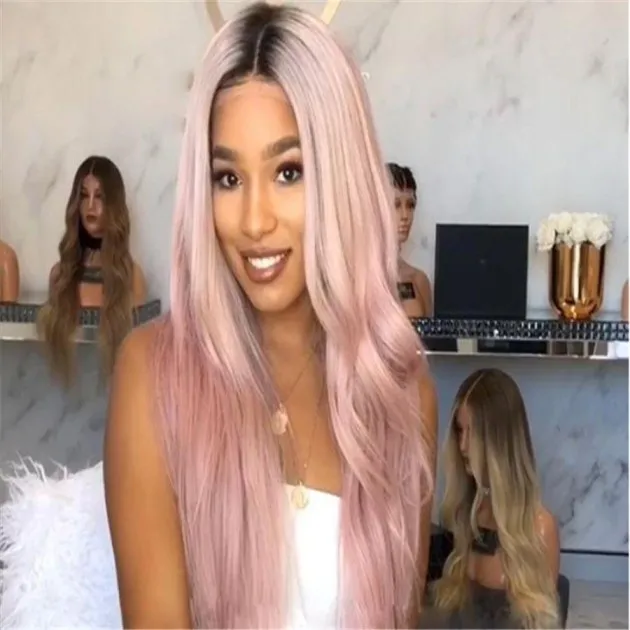 Long curly ombre dark to pink hair wig.